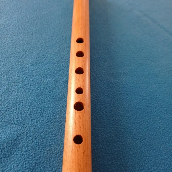 Quena en haya rosada